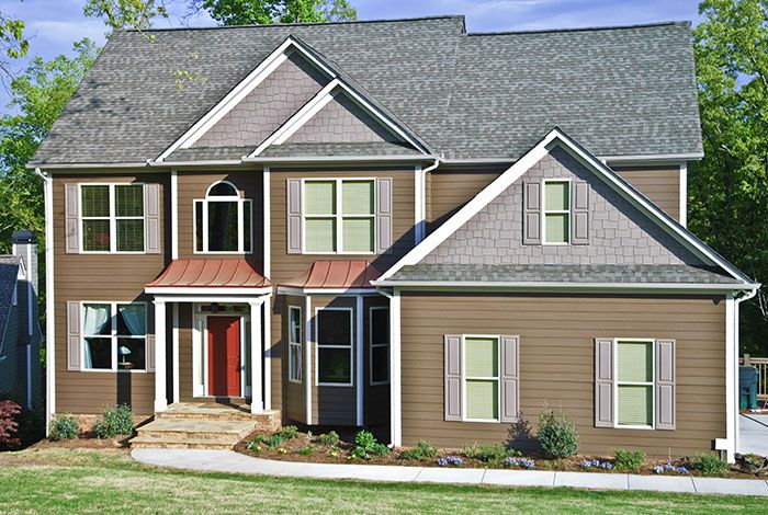 Large two-story home in columbia in tan hardieplank siding.